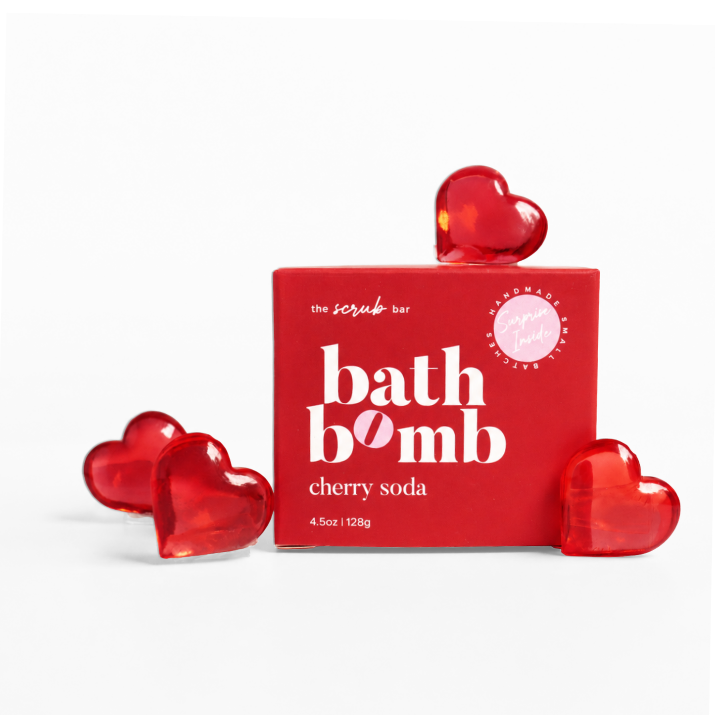 Heart-shaped surprise toy revealed from a Cherry Soda kids bath bomb